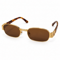 Fendi — Gold Tortoiseshell Medallion Sunglasses — view 1