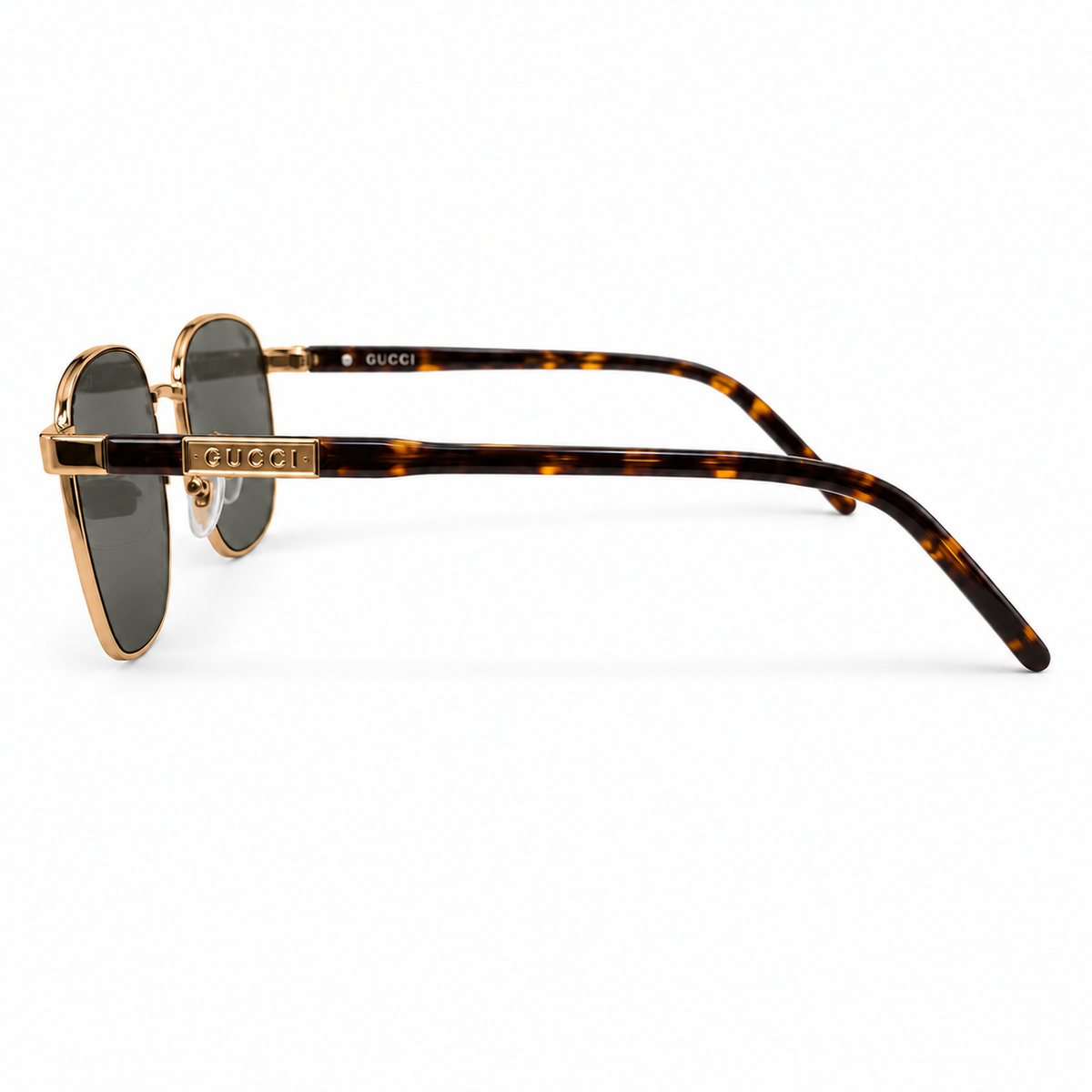 Gucci sunglasses in Gold / Gray-green — side view
