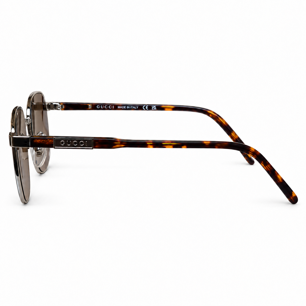 Gucci sunglasses in Silver / Brown — side view
